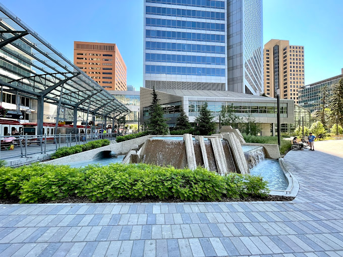 A park is shown in downtown Calgary along the trainline